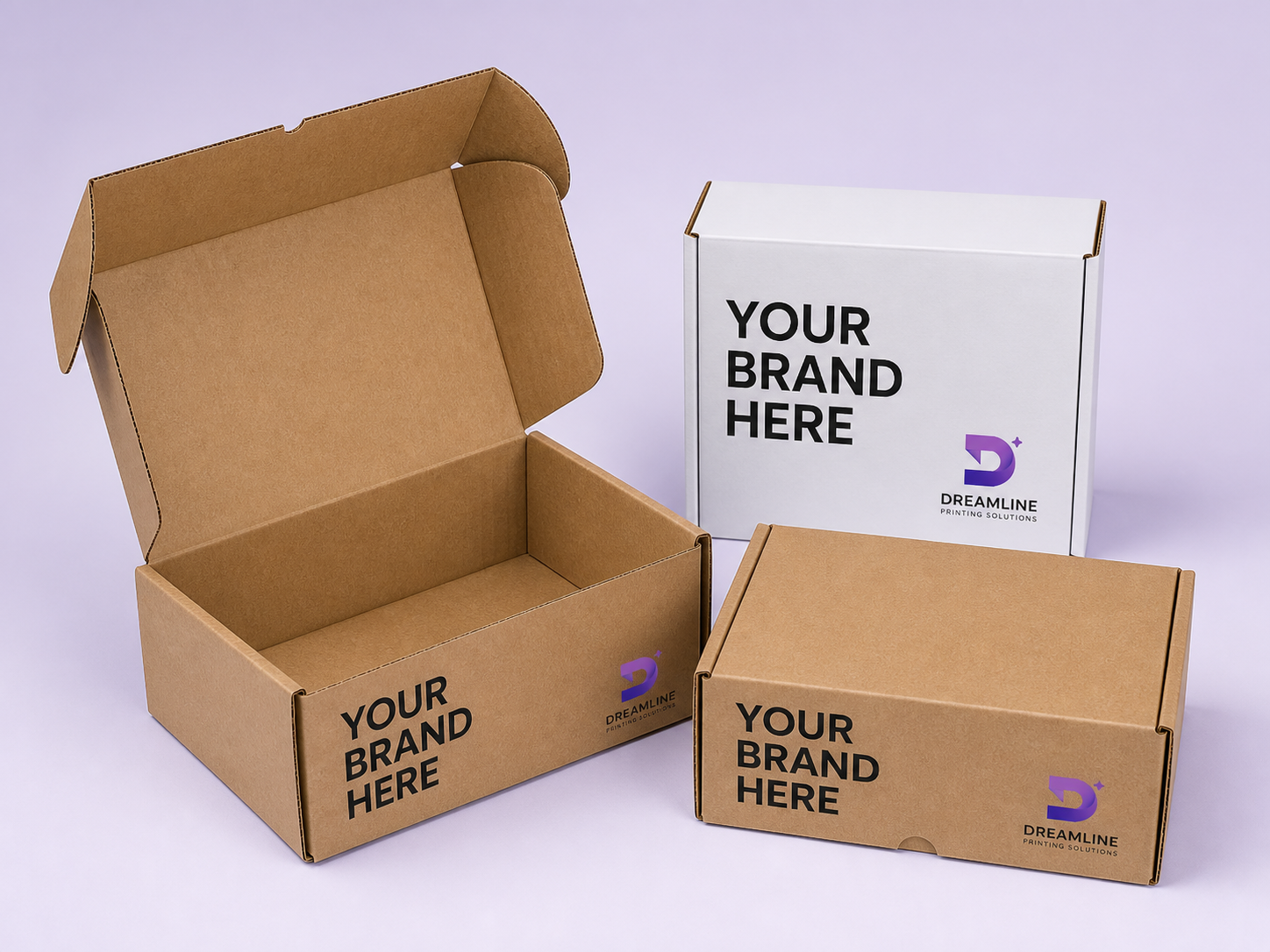 Kraft and white mailer boxes printed with the Dreamline Printing Solutions logo