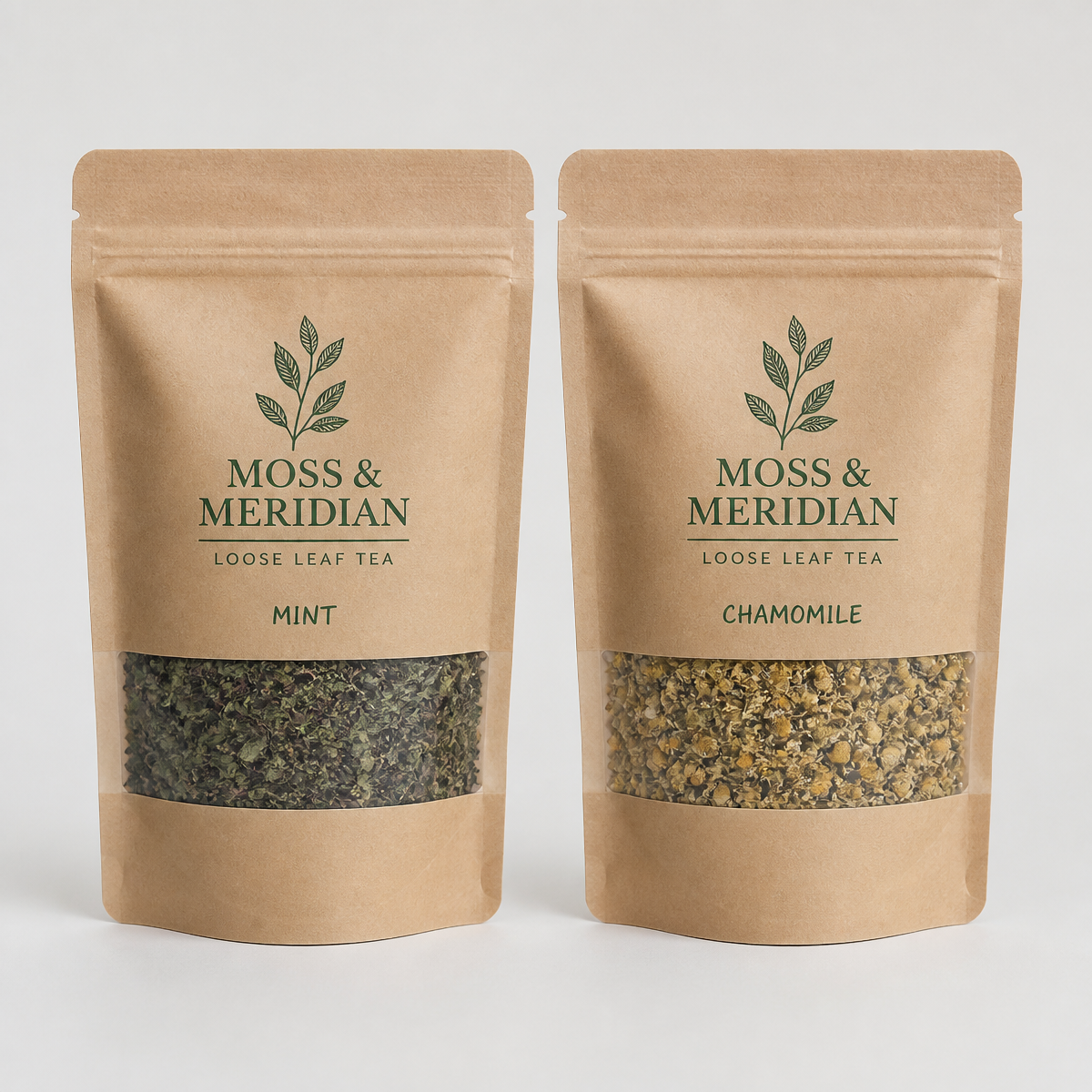 Two kraft window pouches printed with a tea brand logo and flavor names