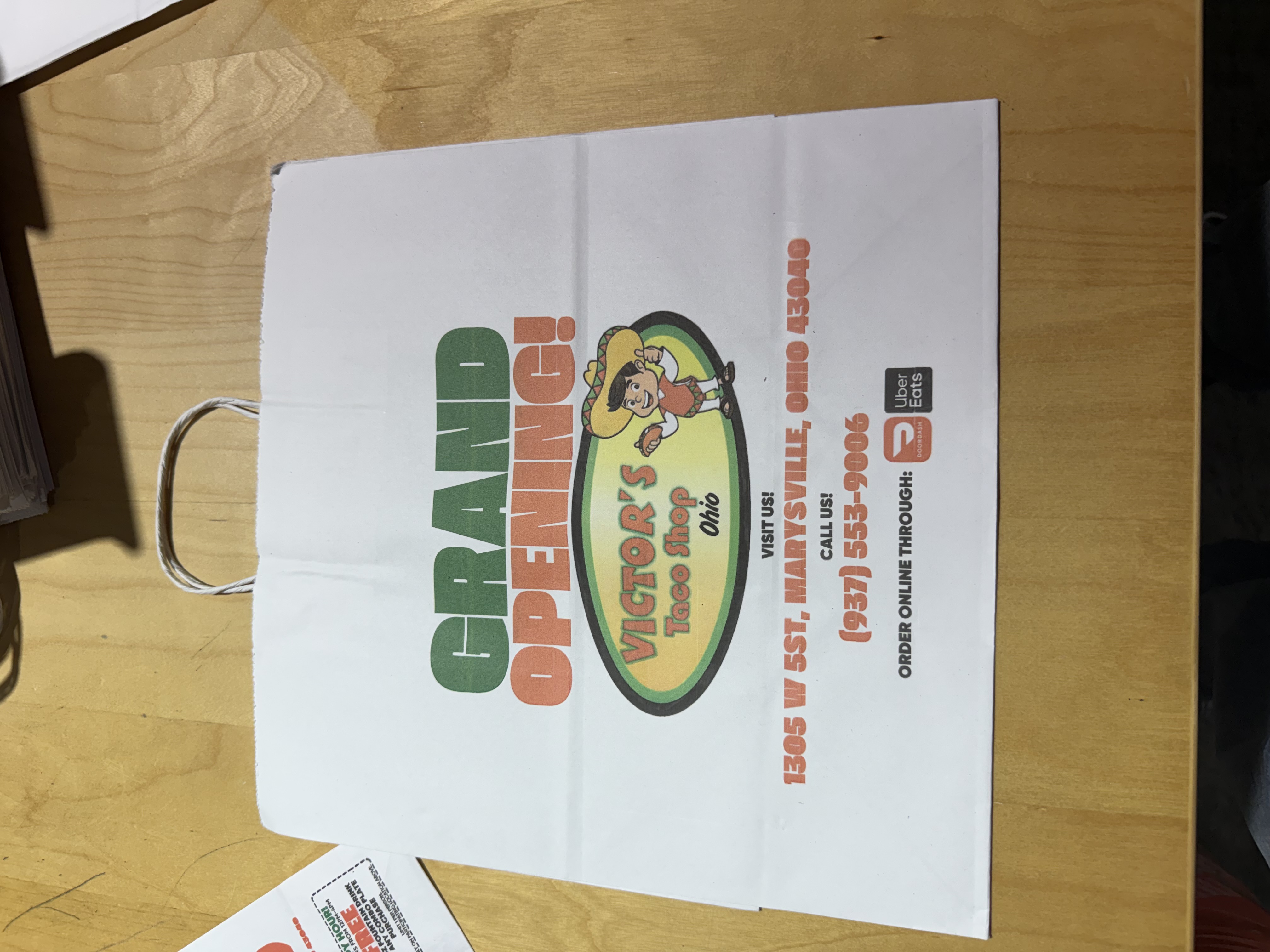 SOS takeout bag printed with a QR code