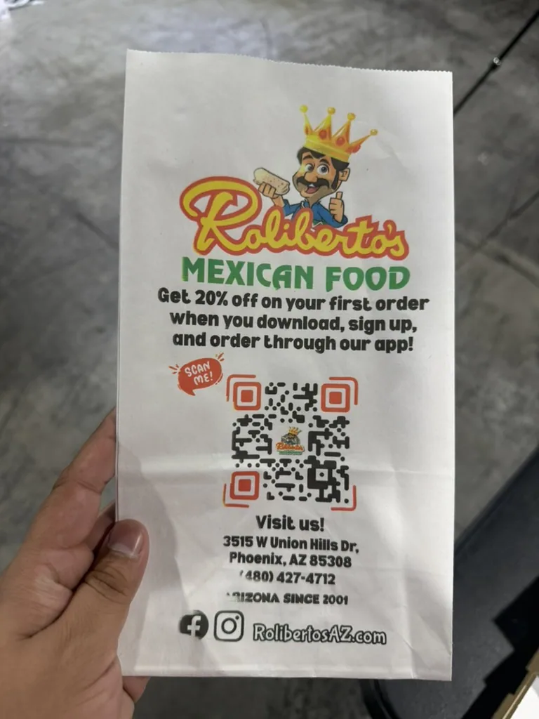 QR code and logo printed on a customer-supplied paper bag